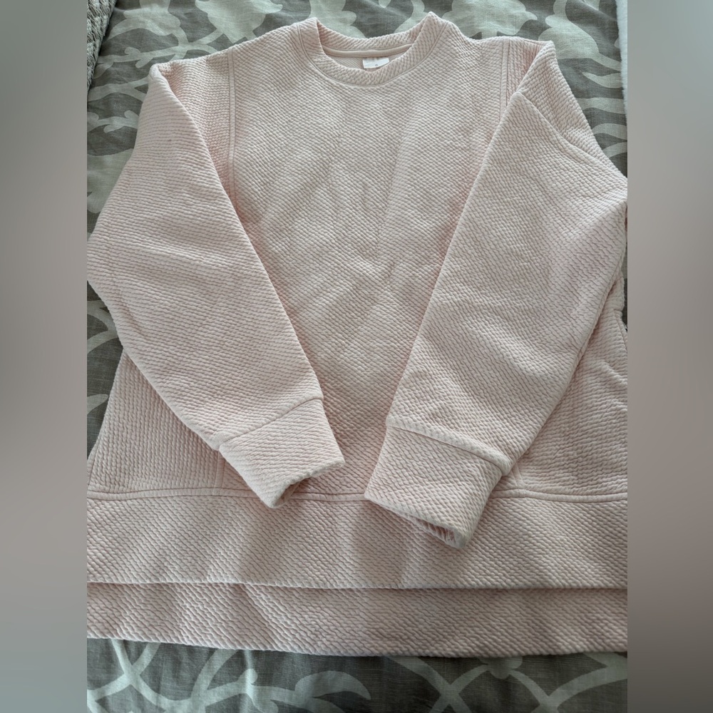 Athleisure: Light pink Calia by Carie Underwood sweatshirt